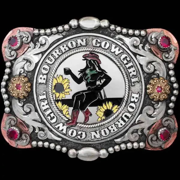Our Kaycee Buckle will make ya feel like THE ""Rhinestone Cowgirl."" This beautiful Buckle is crafted on a matted, German Silver base with an antique finish. It it detailed with German Silver scrolls, beaded edges, Copper elements in e